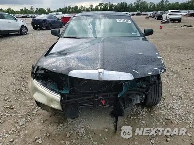 Zdjęcie 14 z 15 samochodu: 2000 LINCOLN TOWN CAR EXECUTIVE VIN:1LNHM81W8YY820974 - miniatura