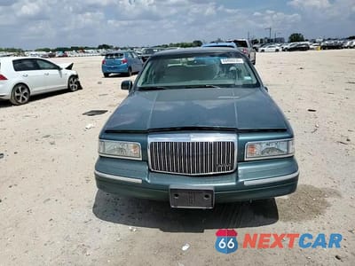 Zdjęcie 13 z 14 samochodu: 1996 LINCOLN TOWN CAR EXECUTIVE VIN:1LNLM81WXTY672992 - miniatura