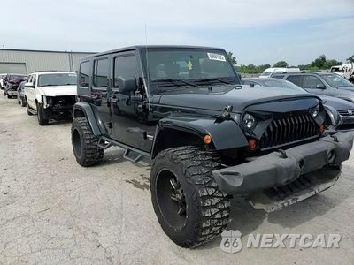 Zdjęcie 14 z 15 samochodu: 2009 JEEP WRANGLER UNLIMITED SAHARA VIN:1J8GA591X9L740681 - miniatura