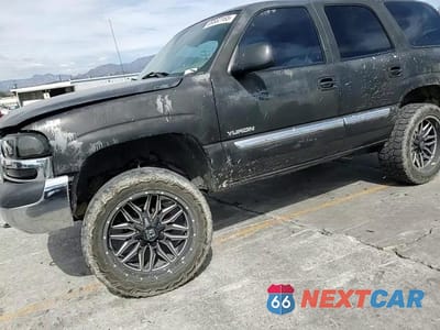 Zdjęcie 14 z 15 samochodu: 2000 GMC YUKON VIN:1GKEC13T2YJ127996 - miniatura