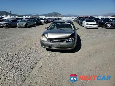 Zdjęcie 14 z 15 samochodu: 2001 FORD TAURUS SES VIN:1FAFP55U71G198976 - miniatura