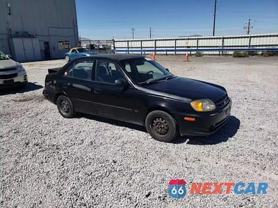 Zdjęcie 14 z 15 samochodu: 2003 HYUNDAI ACCENT GL VIN:KMHCG45C43U465134 - miniatura