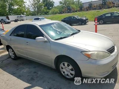 Zdjęcie 13 z 13 samochodu: 2003 TOYOTA CAMRY LE VIN:JTDBE32K330227911 - miniatura