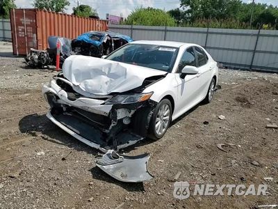 Zdjęcie 13 z 14 samochodu: 2019 TOYOTA CAMRY L VIN:4T1B11HKXKU187773 - miniatura