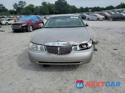 Zdjęcie 14 z 15 samochodu: 2000 LINCOLN TOWN CAR EXECUTIVE VIN:1LNHM81W0YY784410 - miniatura