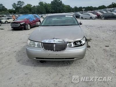 Zdjęcie 14 z 15 samochodu: 2000 LINCOLN TOWN CAR EXECUTIVE VIN:1LNHM81W0YY784410 - miniatura