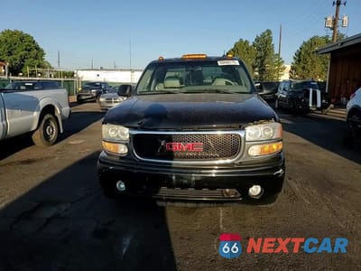 Zdjęcie 13 z 14 samochodu: 2002 GMC SIERRA K1500 DENALI VIN:2GTFK69U921389080 - miniatura