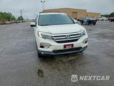 Zdjęcie 14 z 16 samochodu: 2018 HONDA PILOT EXLN VIN:5FNYF5H70JB007310 - miniatura