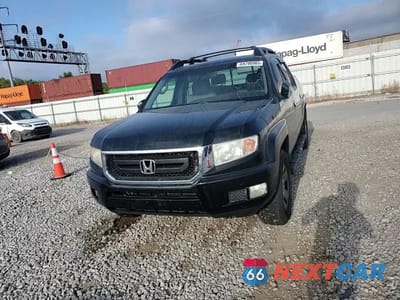 Zdjęcie 13 z 14 samochodu: 2011 HONDA RIDGELINE RT VIN:5FPYK1F22BB009547 - miniatura