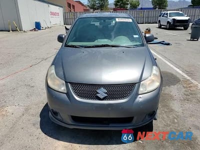 Zdjęcie 13 z 14 samochodu: 2010 SUZUKI SX4 SPORT VIN:JS2YC5A42A6300135 - miniatura