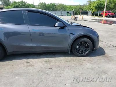Zdjęcie 14 z 14 samochodu: 2023 TESLA MODEL Y VIN:7SAYGDEE8PF699998 - miniatura