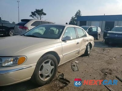 Zdjęcie 13 z 14 samochodu: 2002 LINCOLN CONTINENTAL VIN:1LNHM97V42Y619021 - miniatura