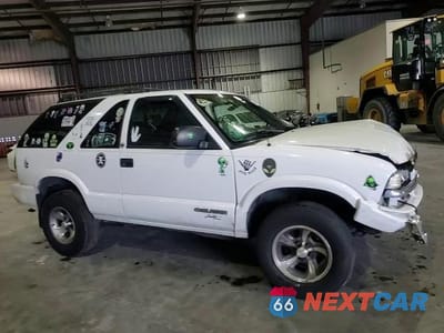 Zdjęcie 14 z 15 samochodu: 2003 CHEVROLET BLAZER VIN:1GNCS18X63K137572 - miniatura