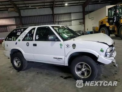 Zdjęcie 14 z 15 samochodu: 2003 CHEVROLET BLAZER VIN:1GNCS18X63K137572 - miniatura