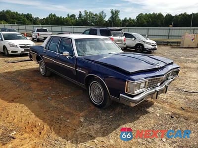 Zdjęcie 13 z 14 samochodu: 1985 OLDSMOBILE DELTA 88 ROYALE BROUGHAM VIN:1G3BY69Y2FY379333 - miniatura