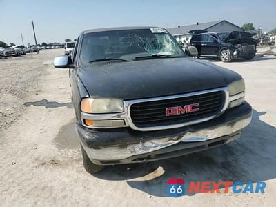 Zdjęcie 13 z 14 samochodu: 2001 GMC NEW SIERRA K1500 VIN:1GTEK19T31Z128300 - miniatura