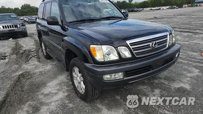 Zdjęcie 14 z 15 samochodu: 2004 LEXUS LX 470 VIN:JTJHT00WX43541878 - miniatura
