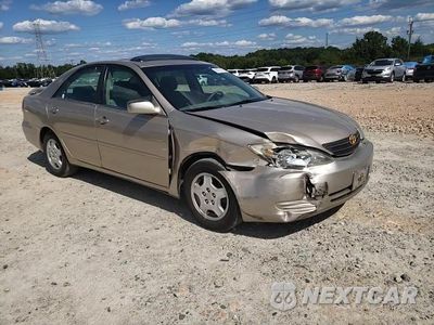 Zdjęcie 13 z 14 samochodu: 2002 TOYOTA CAMRY LE VIN:4T1BF30K02U010951 - miniatura