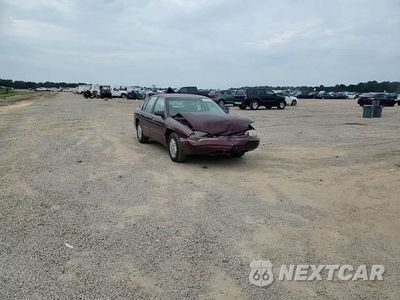 Zdjęcie 13 z 14 samochodu: 2001 CHEVROLET LUMINA VIN:2G1WL52J011254665 - miniatura