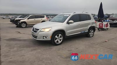 Zdjęcie 13 z 14 samochodu: 2010 VOLKSWAGEN TIGUAN S VIN:WVGAV7AX3AW513375 - miniatura