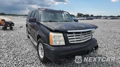 Zdjęcie 14 z 15 samochodu: 2004 CADILLAC ESCALADE ESV VIN:3GYFK66N44G254882 - miniatura