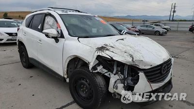 Zdjęcie 14 z 14 samochodu: 2016 MAZDA CX-5 GT VIN:JM3KE4DY2G0703456 - miniatura