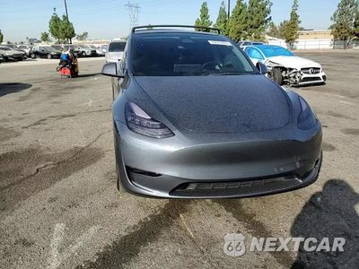 Zdjęcie 14 z 15 samochodu: 2023 TESLA MODEL Y VIN:7SAYGDEE7PA067247 - miniatura