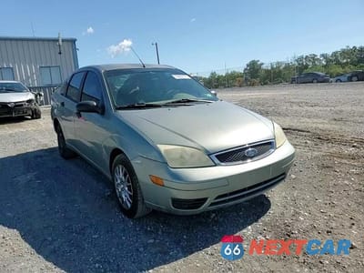 Zdjęcie 13 z 14 samochodu: 2005 FORD FOCUS ZX4 VIN:1FAHP34N05W110059 - miniatura