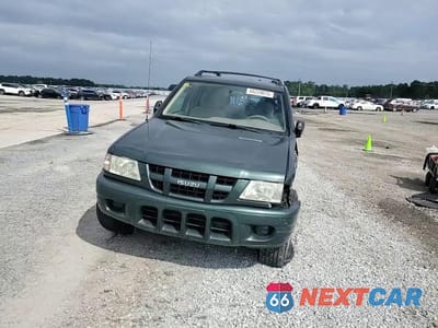 Zdjęcie 14 z 15 samochodu: 2004 ISUZU RODEO S VIN:4S2CK58Y044305208 - miniatura