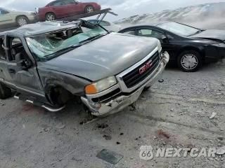 Zdjęcie 10 z 13 samochodu: 2000 GMC NEW SIERRA K1500 VIN:1GTEK19T1YE183698 - miniatura