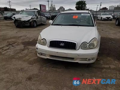 Zdjęcie 11 z 13 samochodu: 2003 HYUNDAI SONATA GL VIN:KMHWF25H23A860138 - miniatura