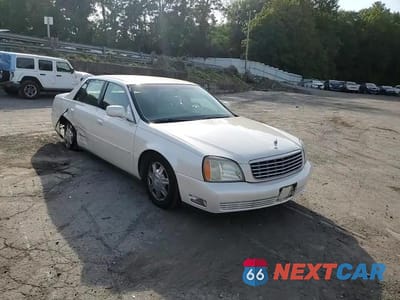 Zdjęcie 10 z 14 samochodu: 2003 CADILLAC DEVILLE VIN:1G6KD54Y03U232818 - miniatura