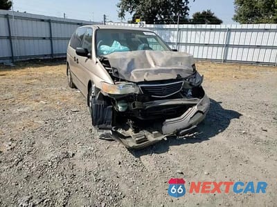 Zdjęcie 11 z 15 samochodu: 1999 HONDA ODYSSEY LX VIN:2HKRL1851XH511430 - miniatura
