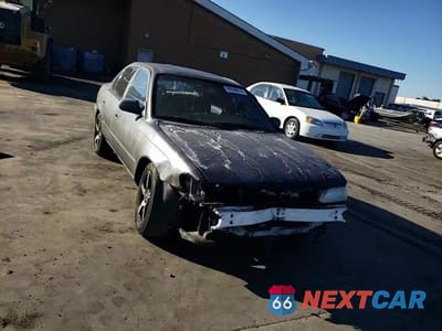 Zdjęcie 11 z 14 samochodu: 1996 TOYOTA COROLLA VIN:1NXBA02E4TZ362985 - miniatura