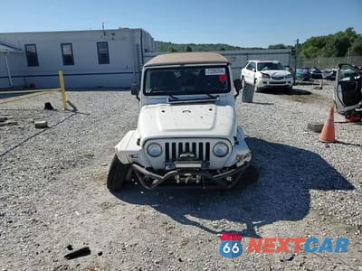 Zdjęcie 10 z 14 samochodu: 2000 JEEP WRANGLER / TJ SAHARA VIN:1J4FA59SXYP764539 - miniatura