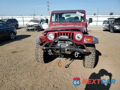 Zdjęcie 13 z 14 samochodu: 1999 JEEP WRANGLER / TJ SPORT VIN:1J4FY19S8XP480961 - miniatura