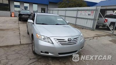 Zdjęcie 13 z 14 samochodu: 2007 TOYOTA CAMRY LE VIN:4T1BK46K17U022719 - miniatura