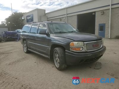 Zdjęcie 14 z 15 samochodu: 2003 GMC YUKON XL DENALI VIN:1GKFK66U53J167510 - miniatura