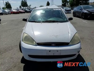 Zdjęcie 13 z 14 samochodu: 2001 FORD FOCUS LX VIN:1FAFP33PX1W294849 - miniatura