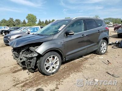 Zdjęcie 14 z 15 samochodu: 2015 FORD ESCAPE TITANIUM VIN:1FMCU0JX7FUB91880 - miniatura