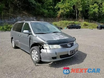 Zdjęcie 14 z 15 samochodu: 2002 HONDA ODYSSEY EXL VIN:2HKRL18092H511642 - miniatura