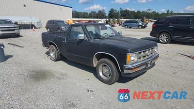 Zdjęcie 14 z 15 samochodu: 1992 GMC SONOMA VIN:1GTCS14R2N8524183 - miniatura