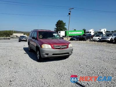 Zdjęcie 15 z 16 samochodu: 2001 MAZDA TRIBUTE DX VIN:4F2YU06191KM42739 - miniatura