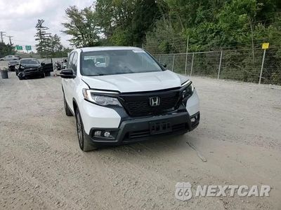 Zdjęcie 14 z 16 samochodu: 2020 HONDA PASSPORT EXL VIN:5FNYF8H50LB016902 - miniatura
