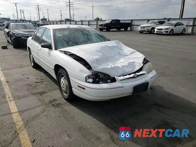 Zdjęcie 13 z 14 samochodu: 1998 CHEVROLET LUMINA BASE VIN:2G1WL52M6W9114431 - miniatura