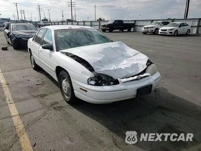 Zdjęcie 13 z 14 samochodu: 1998 CHEVROLET LUMINA BASE VIN:2G1WL52M6W9114431 - miniatura