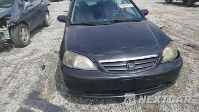 Zdjęcie 14 z 14 samochodu: 2003 HONDA CIVIC LX VIN:2HGES165X3H579105 - miniatura