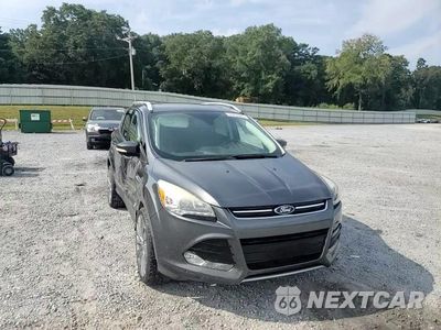 Zdjęcie 14 z 15 samochodu: 2015 FORD ESCAPE TITANIUM VIN:1FMCU0J92FUB87804 - miniatura