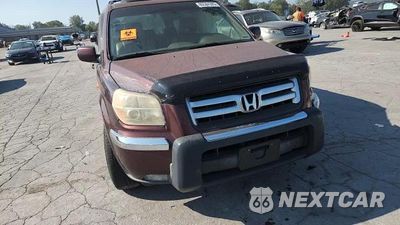 Zdjęcie 14 z 14 samochodu: 2007 HONDA PILOT EXL VIN:5FNYF18577B009023 - miniatura