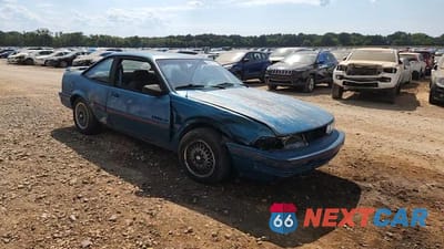Zdjęcie 13 z 14 samochodu: 1994 PONTIAC SUNBIRD LE VIN:1G2JB14T4R7546107 - miniatura